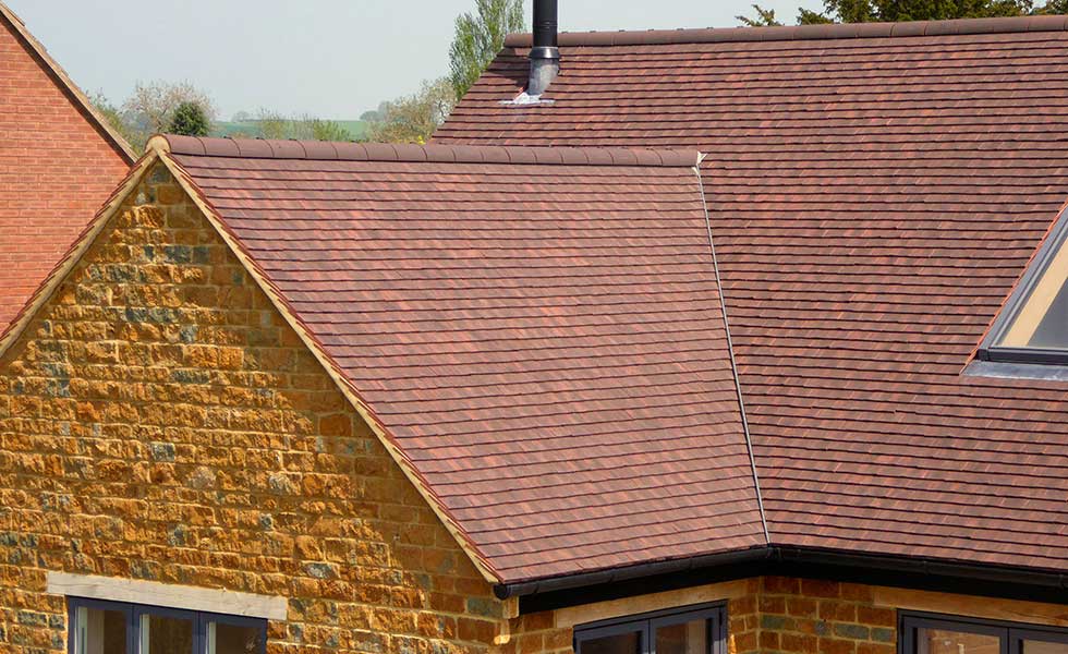 Roof tile replacement costs in the UK // Roofcosts.co.uk